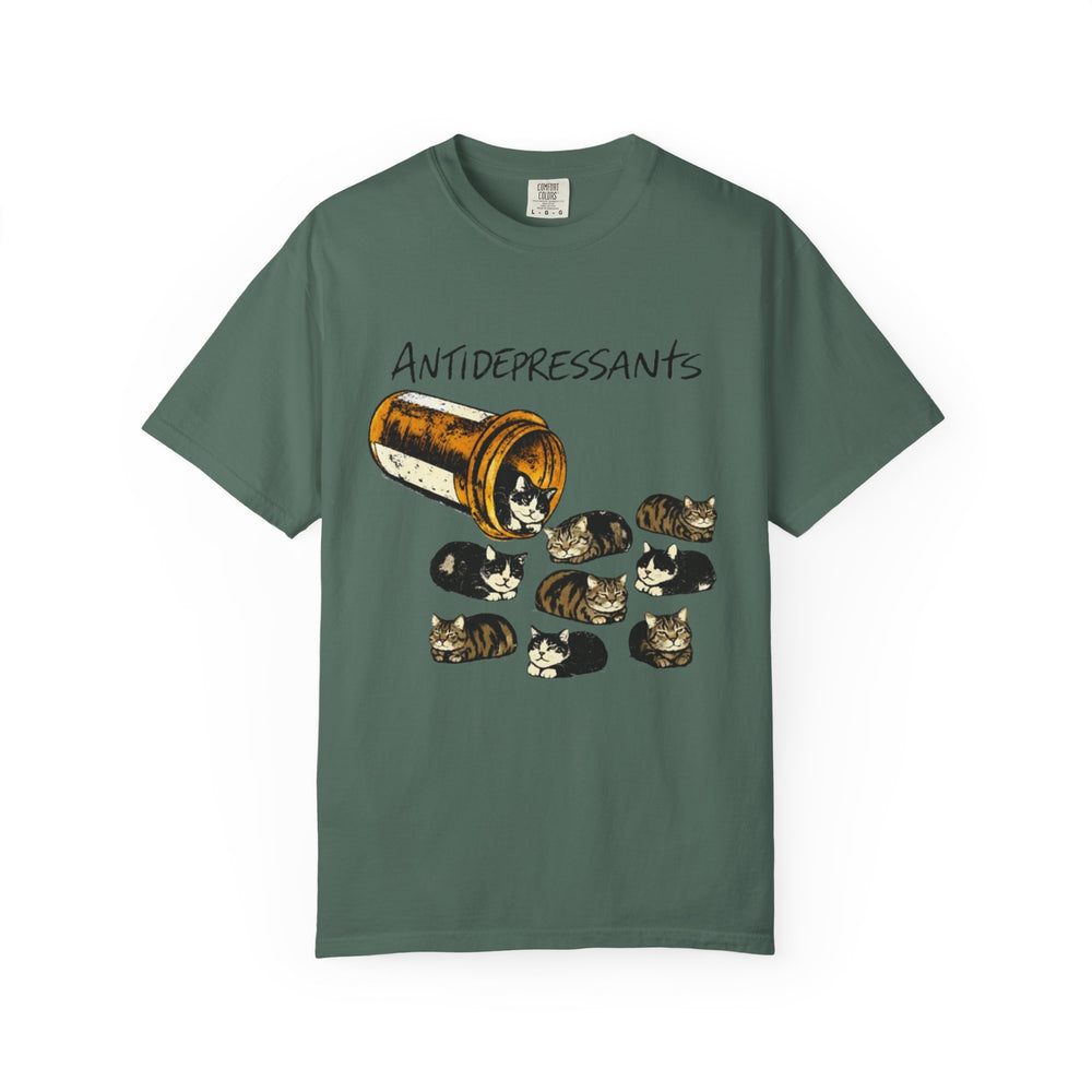 Green t-shirt with a graphic of a bottle labeled 'Antidepressants' and cats on a white background